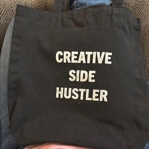 Black Canvas Tote Bag with Bold White Text